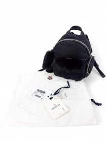 Moncler nylon and fur backpack.