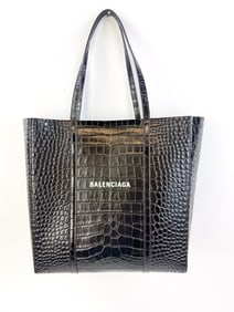 Balenciaga black croc-embossed tote.