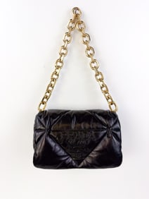 Prada black quilted leather shoulder bag.