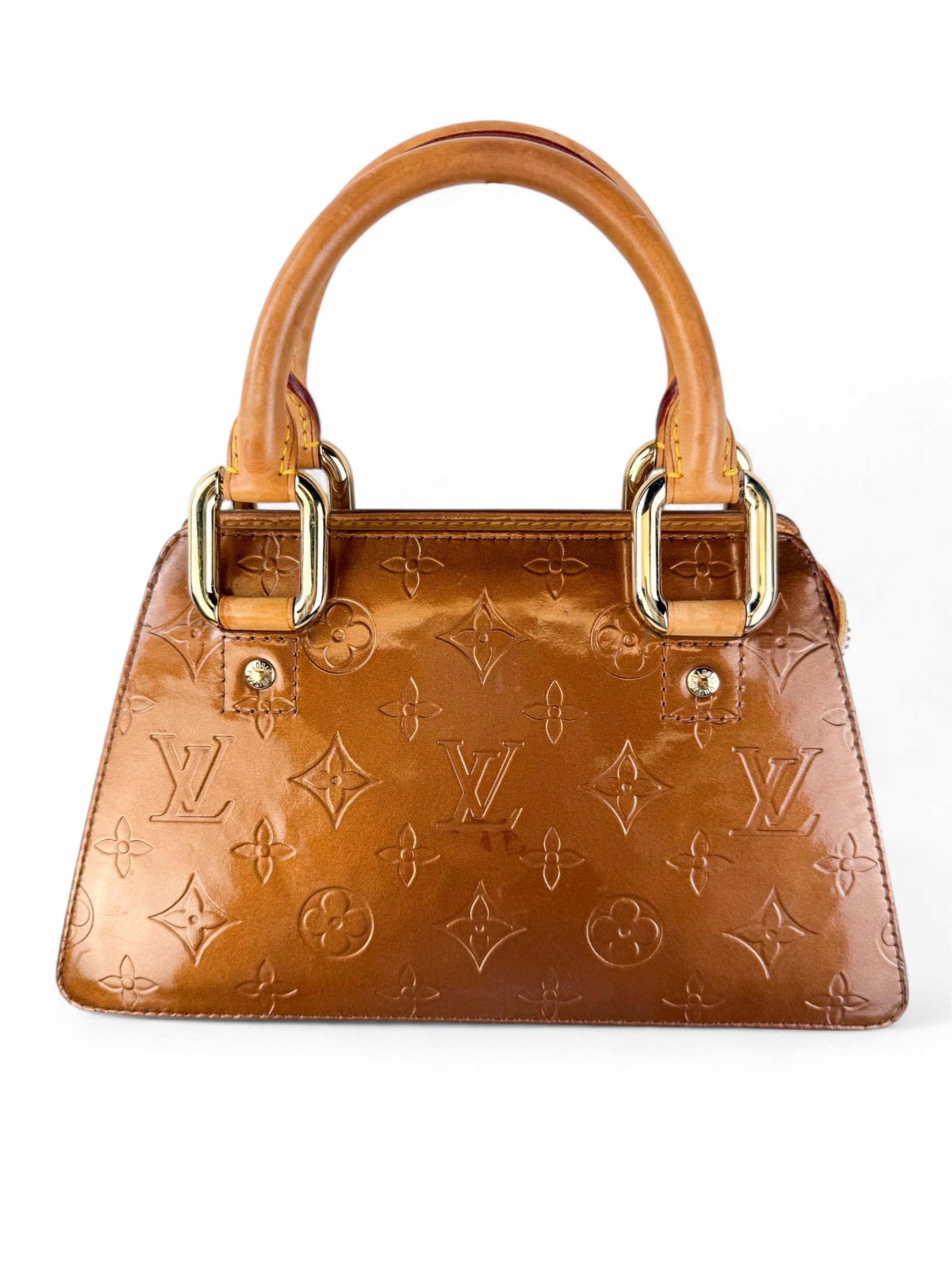 Louis Vuitton Mini Forsyth handbag.: A Louis Vuitton Mini Forsyth handbag in metallic bronze Monogram Vernis patent leather with adjustable strap. Condition: Residue inside.