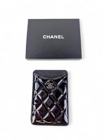 Chanel patent leather quilted card holder.