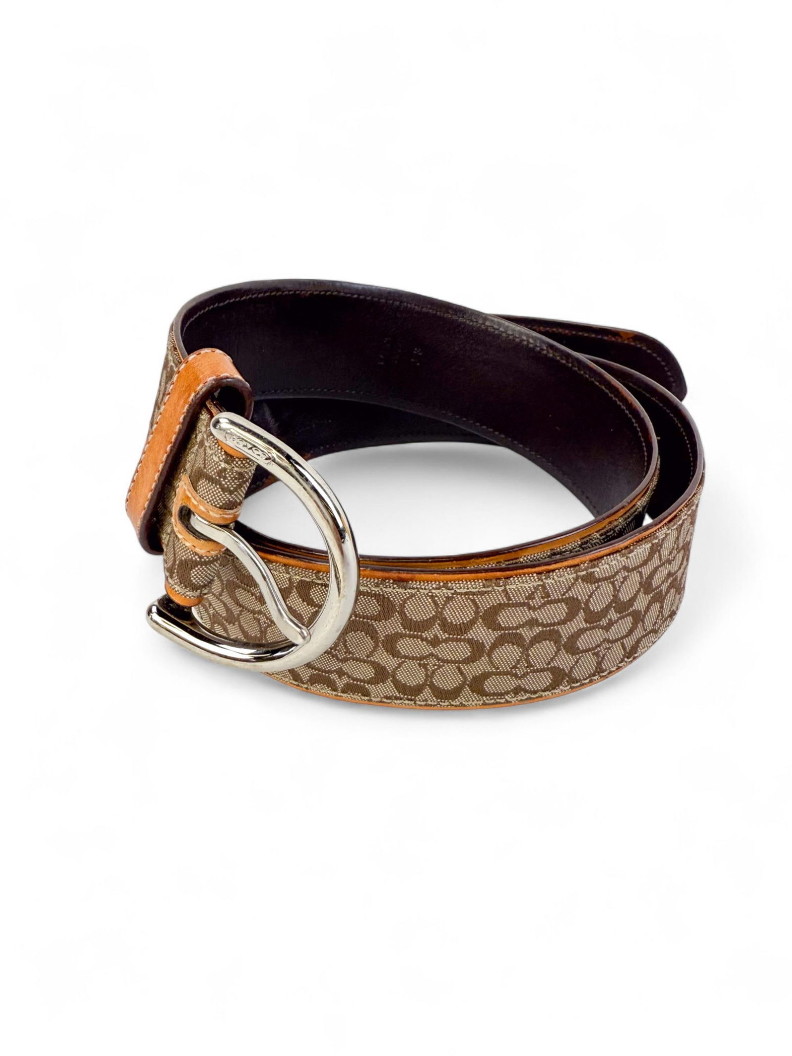 Coach leather belt.: A Coach belt in black leather with silver-tone buckle.