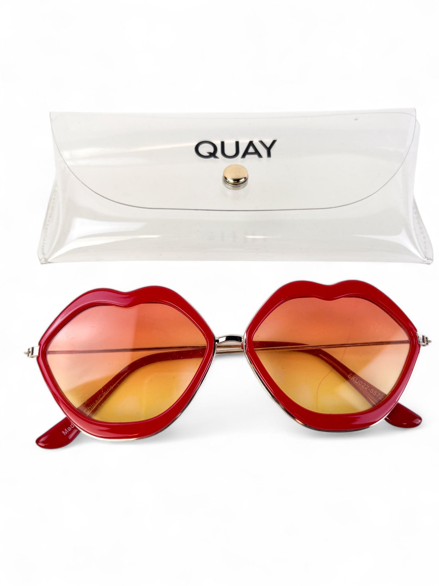 Quay lips sunglasses.: A pair of Quay lips-shaped sunglasses.