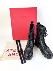Valentino cut-out detailed combat boots.