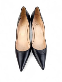 Christian Louboutin black heels.