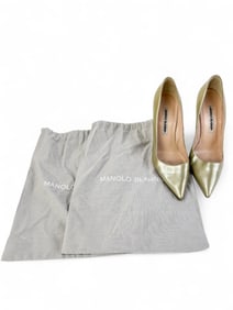 Manolo Blahnik gold heels.