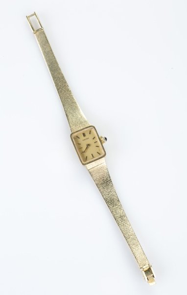 Concord 14 KT gold ladies wrist watch: A Concord 14 KT yellow gold ladies wrist watch. Face: 3/4"l x 1/2"w. Band: 1/2"l. 0.81 t ozs.