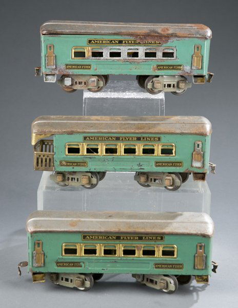 Group of 3 American Flyer Lines train cars: A group of three American Flyer green train cars. 8 1/4"l.