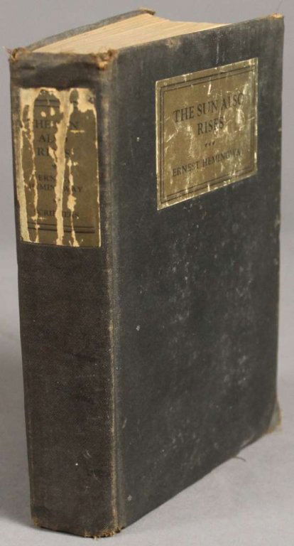 Ernest Hemingway. THE SUN ALSO RISES. 1st issue.: [Hemingway, Ernest]. THE SUN ALSO RISES. NY: Charles Scribner’s Sons, 1926. 8vo. Black cloth. Worn particularly on labels, corners, and edges of covers. Stamp and notations to rfep. Several weak poi