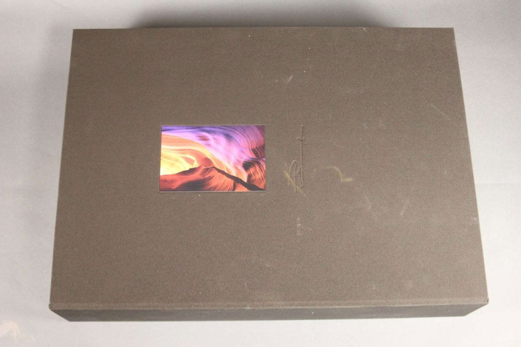 PETER LIK: MASTER PHOTOGRAPHER -AIPP.: [Photography]. PETER LIK: MASTER PHOTOGRAPHER – AIPP. (Los Vegas: Self-published). Folio. Original suede; near fine in near fine black cloth clamshell case. Consists of breathtaking illustrations fr