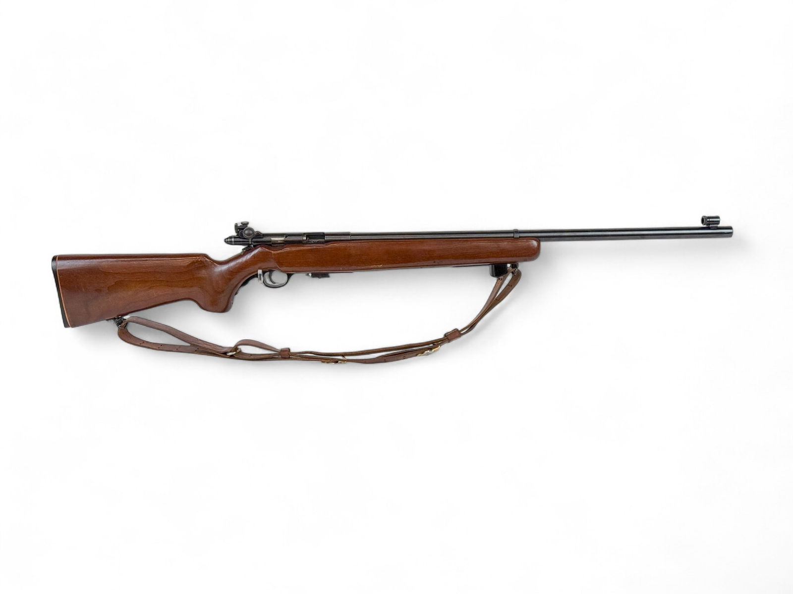 Mossberg M144LS-A bolt action rifle, .22 Cal.: [Modern Firearm] An O.F. Mossberg Model 144LS-A bolt action rifle, .22 S, L, & LR. Circa 1960-1972. Blued finish. 26" barrel with hooded front sight. Walnut pistol grip stock. Includes Mossberg S33 ap