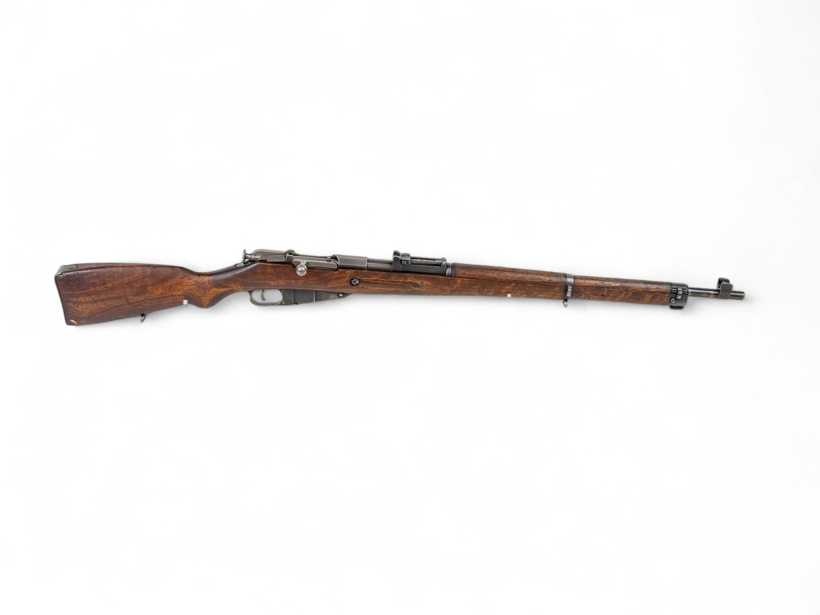 VKT, Finnish Mosin Nagant M/39 rifle, 7.62x54R: [Modern Firearm] A 1944 VKT, Finland Mosin Nagant M/39 bolt action rifle, 7.62?54mmR . Blued finish. 27" barrel with rear ladder sight and front hooded post. Walnut semi pistol grip stock. Stamped ser