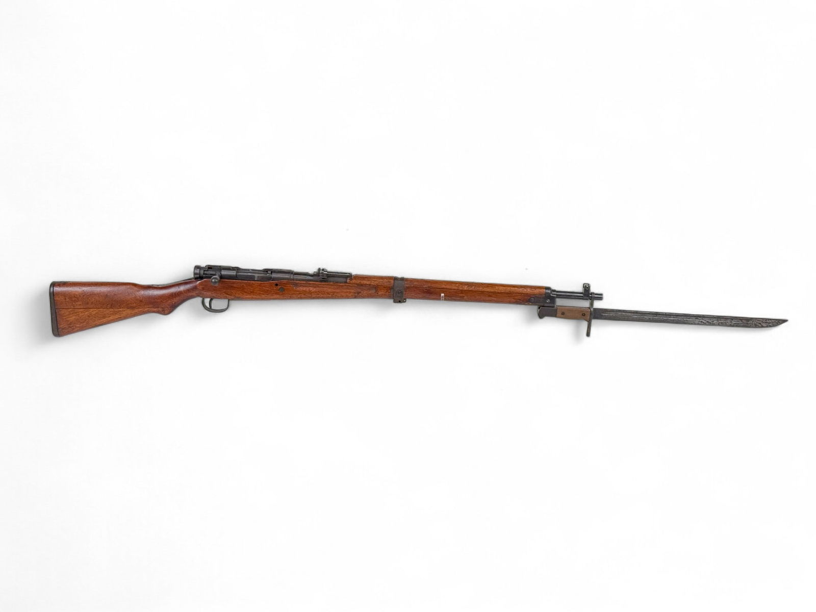 Japan Type 99 bolt action Short Rifle, 7.7?58mm: [Modern Firearm] A Japan Type 99 Series 21 bolt action Short Rifle, 7.7?58mm. Blued finish. 25 3/4" barrel with rear ladder sight. Wood stock. Includes Late-War Japanese KK Matsushita Kinzoku Type 30