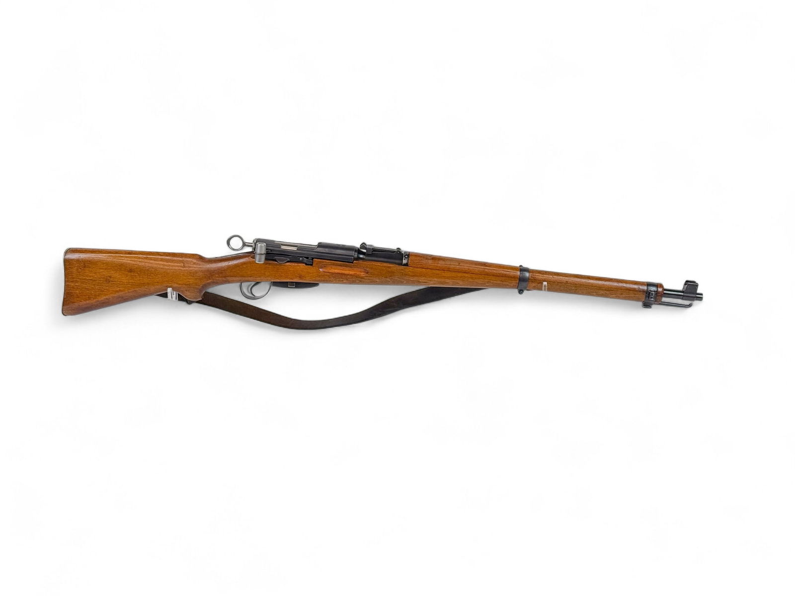 Waffenfabrik Bern Swiss K31 rifle, 7.5?55mm: [Modern Firearm] A Waffenfabrik Bern Swiss K31 bolt action rifle, 7.5?55mm. Blued finish. 43 1/2" barrel with rear ladder sight. Wood stock. Electro pencil PW ARMS REDMONT WA on sight. Includes 5 roun