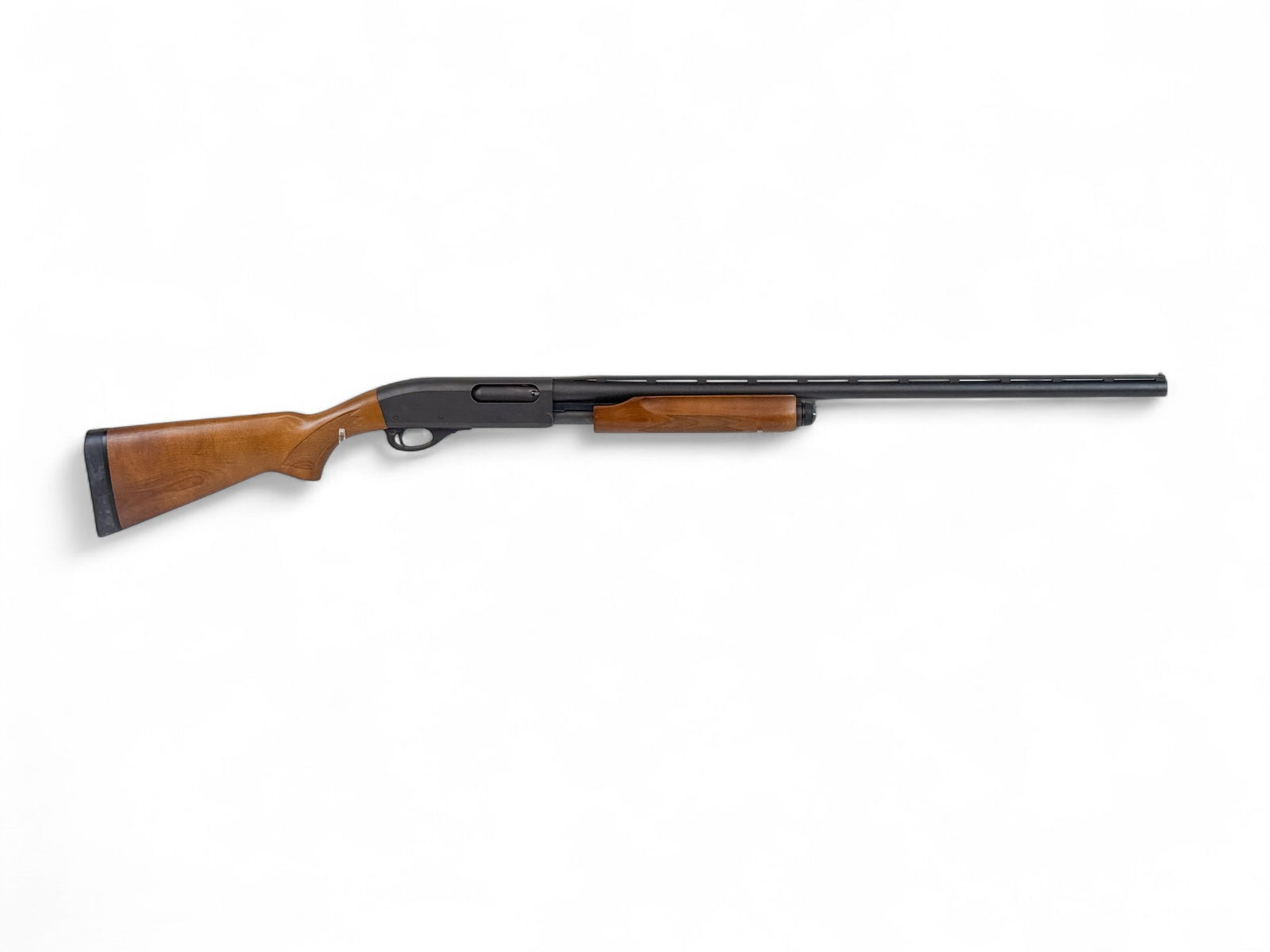 Remington 870 Express Magnum shotgun, 20 Gauge: [Modern Firearm] A Remington Model 870 Express Magnum slide action shotgun, 20 Gauge. Blued finish. 28" vent ribbed barrel with choke tube, Imp. Cyl. choke, and Full Choke, and extra 28" vent ribbed b