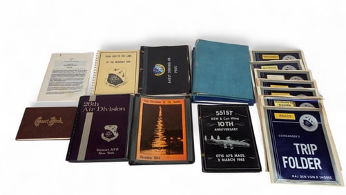 Gen. Shores trip folders and photo albums