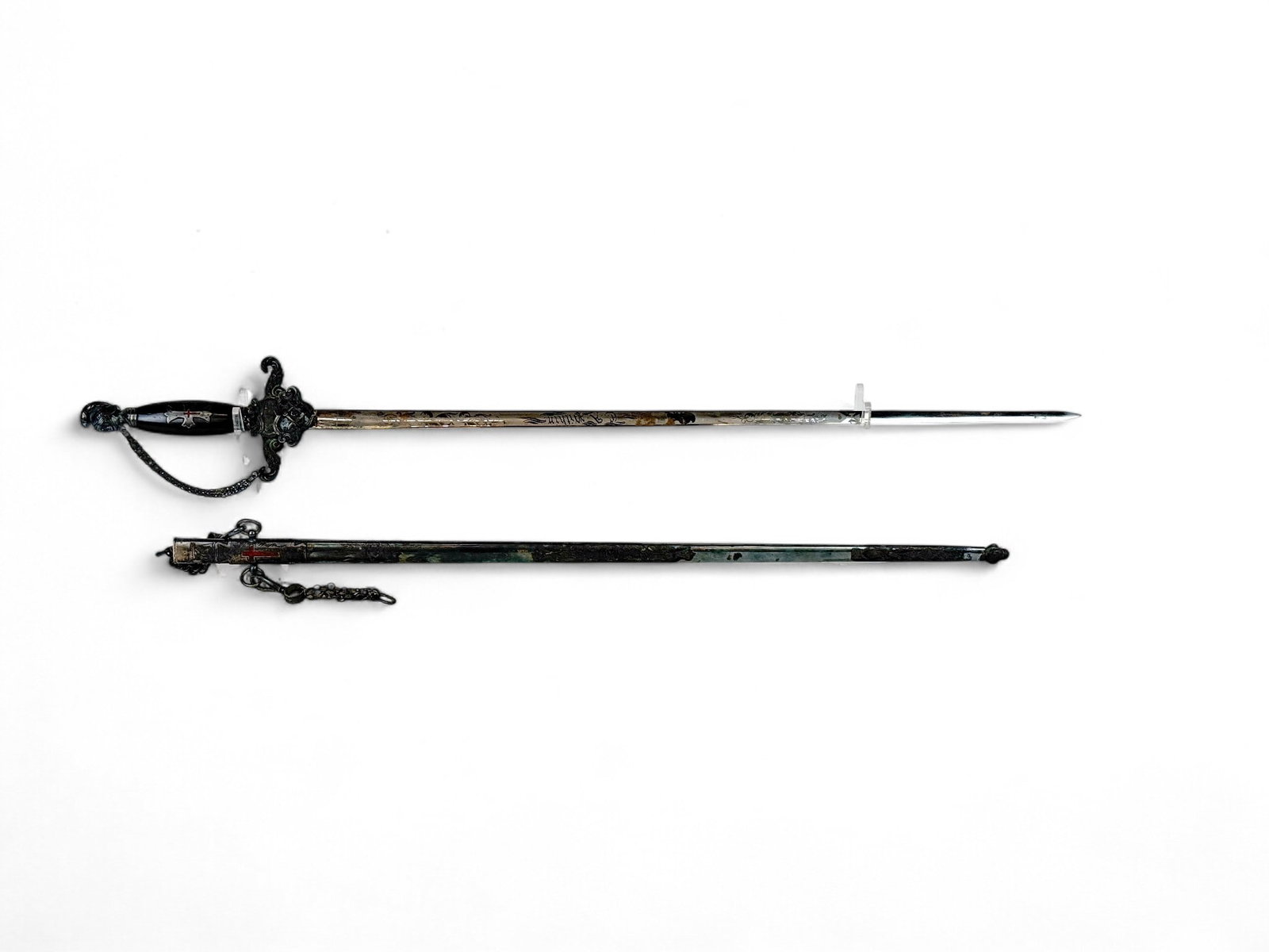 Amnes York Rite Masonic sword.: An Amnes York Rite Masonic sword. 28" blade Etched "WASHINGTON COMMANDERY No. 1" and "C.A. Pitkin." Marked Amnes on scabbard throat and ricasso. 29 1/2" scabbard. 36 1/4" overall.