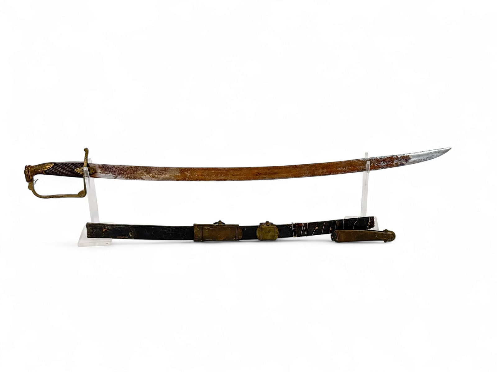 Continental Hussar type sword: A Continental Hussar type sword. Gilt brass crossguard and pommel hand decorated with hand etched anchor and two headed eagle. Checkered solid wood grips. leather and brass mounted scabbard. 27" blade