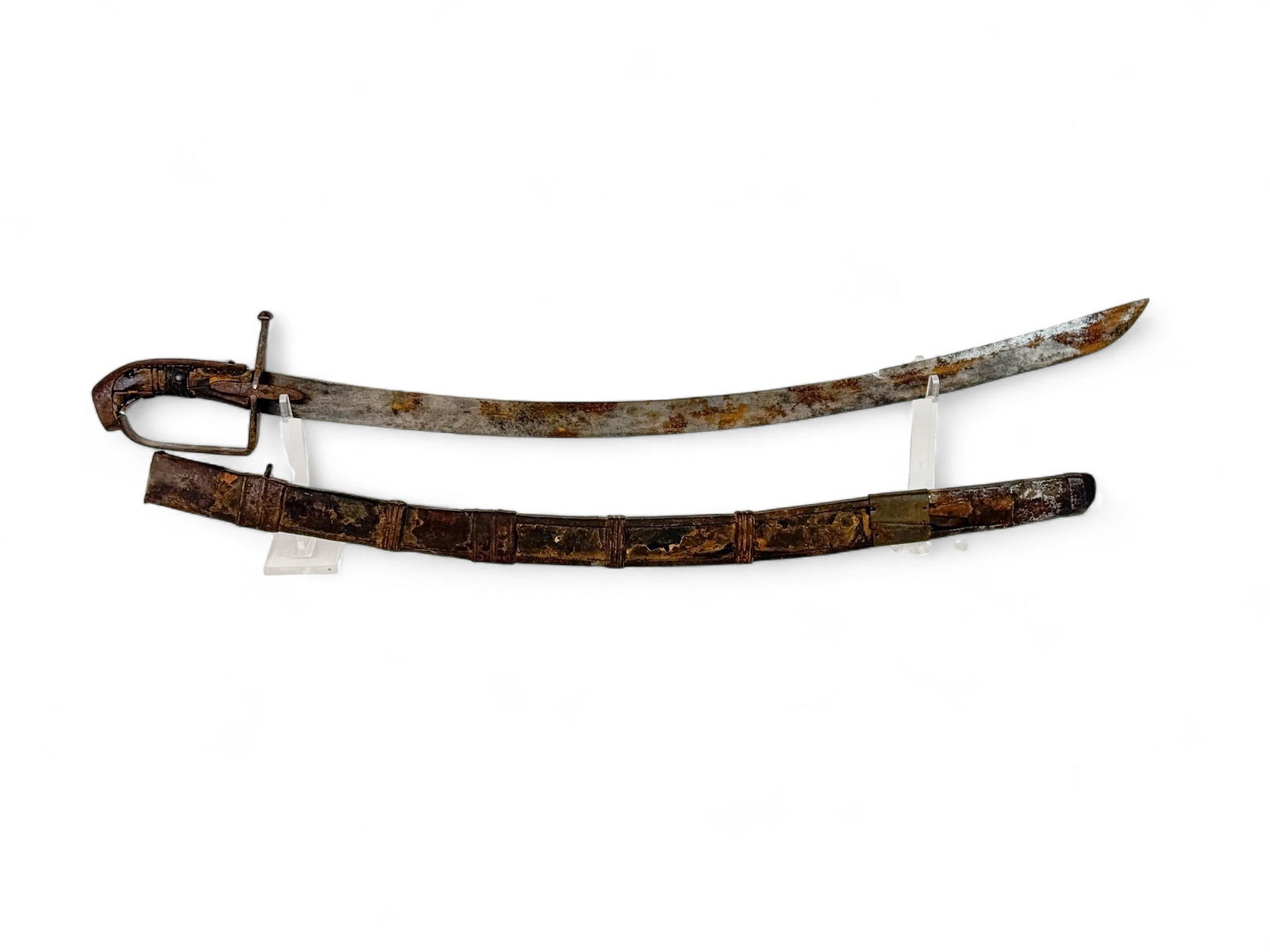 Hussar szabla sword and scabbard,: A Hussar szabla sword and scabbard, 17th or 18th Century. 30" blade. Iron crossguard, guard and pommel. Leather wrapped wood grip. 32 1/2" Leather wrapped wood scabbard with iron mounts. 35 1/2" overa