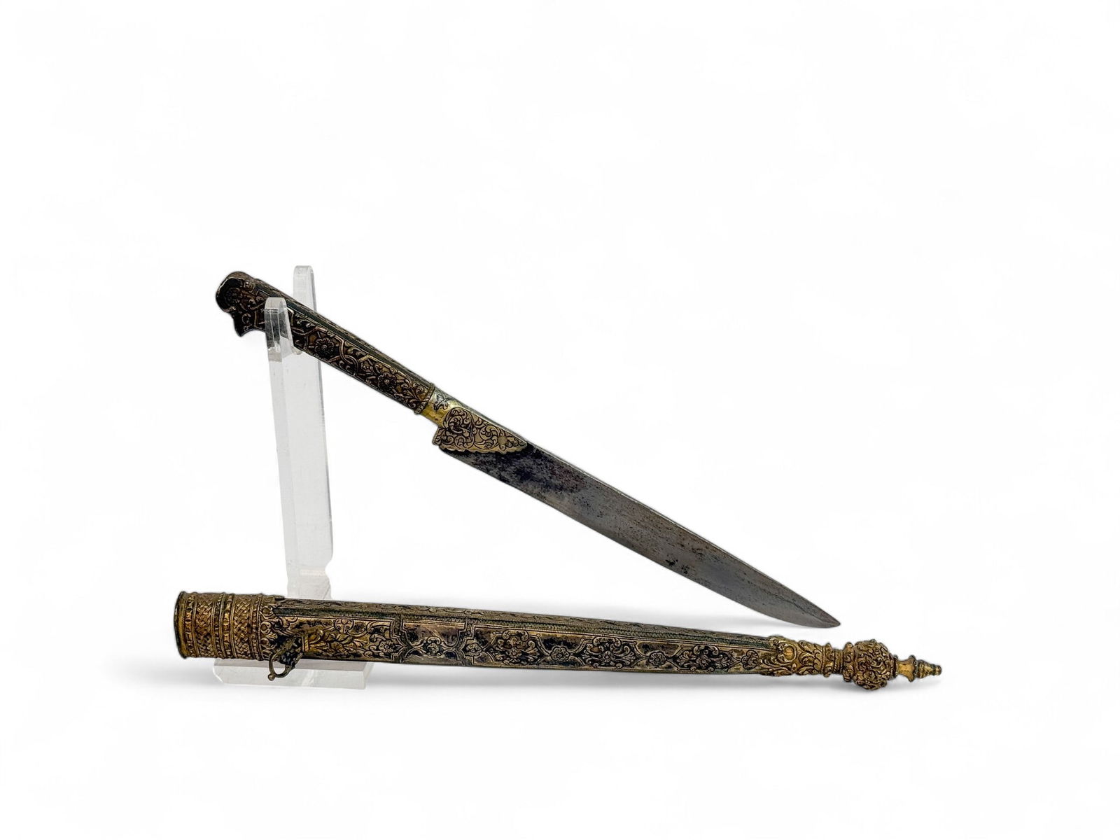Balkan Bichaq yatagan dagger with scabbard.: A Ottoman Balkan Bichaq yatagan dagger with scabbard Silver with gold wash scabbard and grip. 7 1/2" single edged blade. 16" overall.