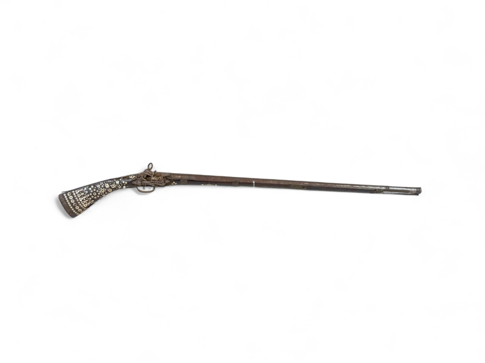 Balkan Dzeferdar Miquelet musket.: [Antique Firearm] An Ottoman Balkan Dzeferdar Miquelet lock musket, 19th Century. 38 1/2" barrel with Niello silver inlay with rear notch and front bead sight. Full length stock with inlaid Mother of 