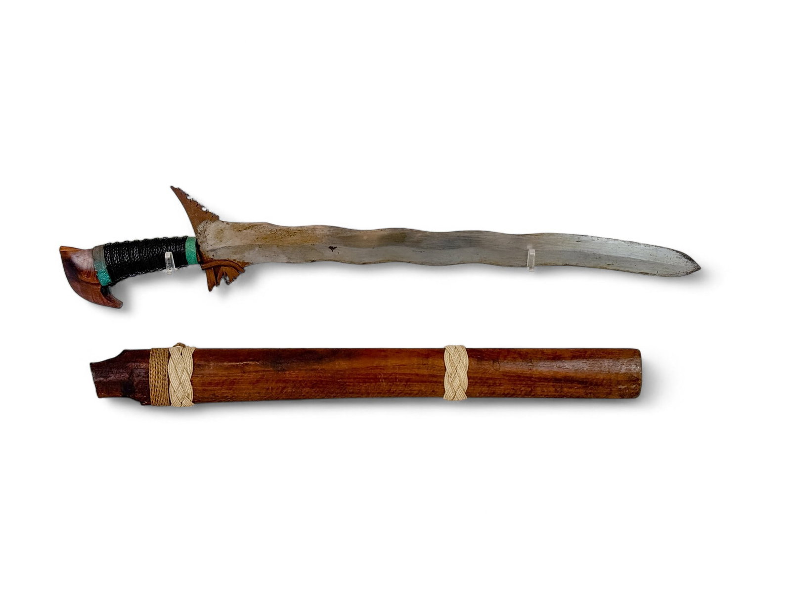 Filipino Moro Kris/ Kalis with scabbard.: A Filipino Moro Kris or Kalis with scabbard. 22" blade. String wrapped grip and wood pommel. 23" simple wood scabbard. 26 1/2" overall. Condition: Oxidation on metal, Particularly on guard and stirrup
