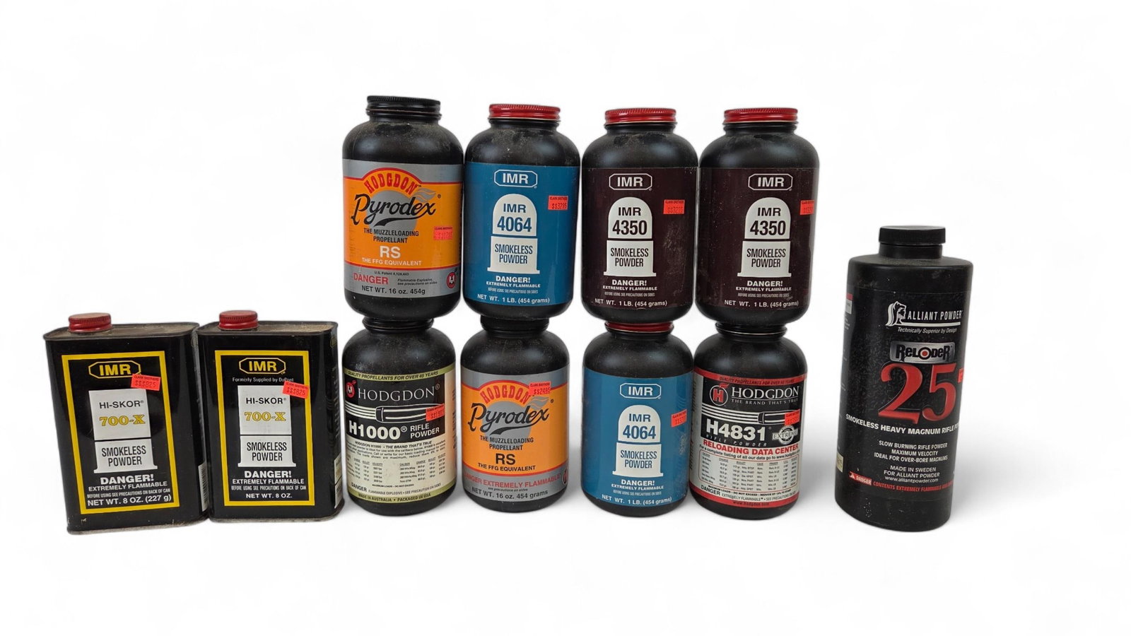 11 1 lb. Smokeless Powder partial containers: A group of eleven one pound Smokeless Powder partially filled containers.
