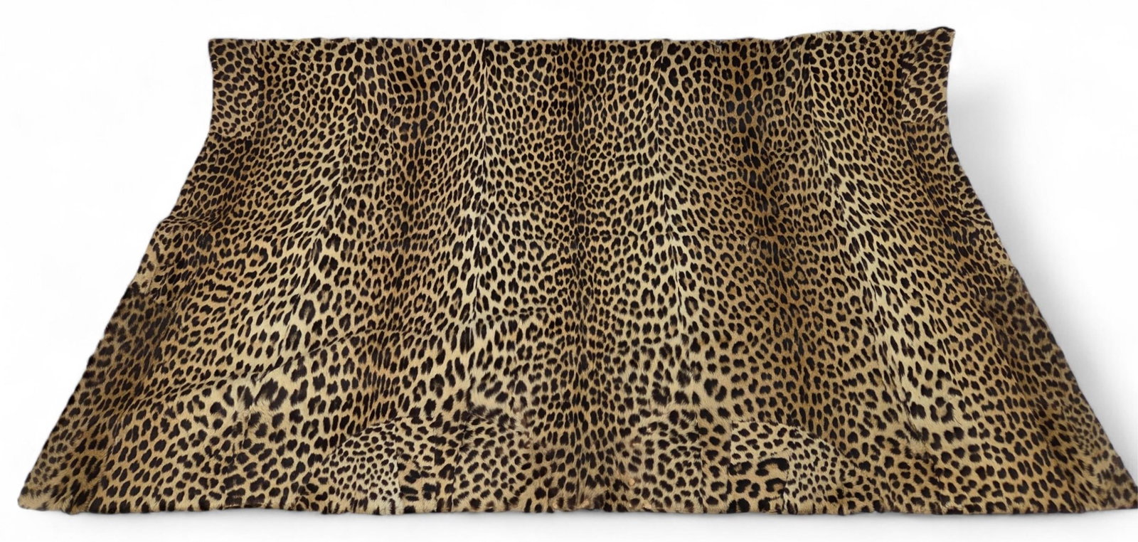 Leopard fur blanket VA BUYERS ONLY: *VIRGINIA BUYERS ONLY* A Leopard fur blanket. Unlined. 56" x 36"