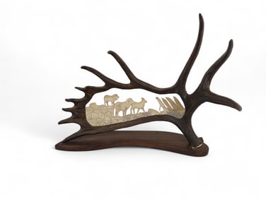 B. Merry carved moose antler