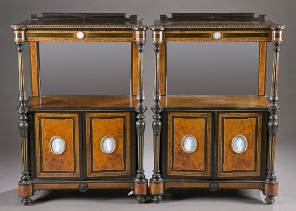 2 walnut/ebonized wood cabinets w/ jasper plaques: A pair of walnut and ebonized cabinets with oval jasper plaques in lower doors. First half 19th century. Top shelf with lower doors supporting a mirrored back surface, with ilt accents with beading on