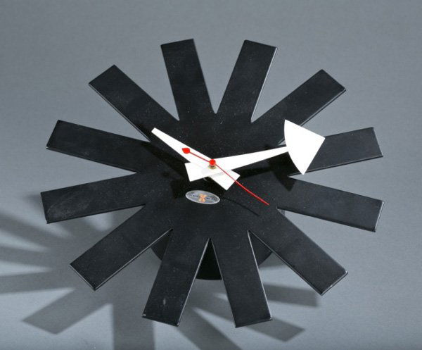 George Nelson, Howard Miller asterisk clock: A George Nelson for Howard Miller asterisk clock. Mid 20th century. On reverse, "02213 Howard Miller Clock Co. Zeeland, Mich.". 10"diam.