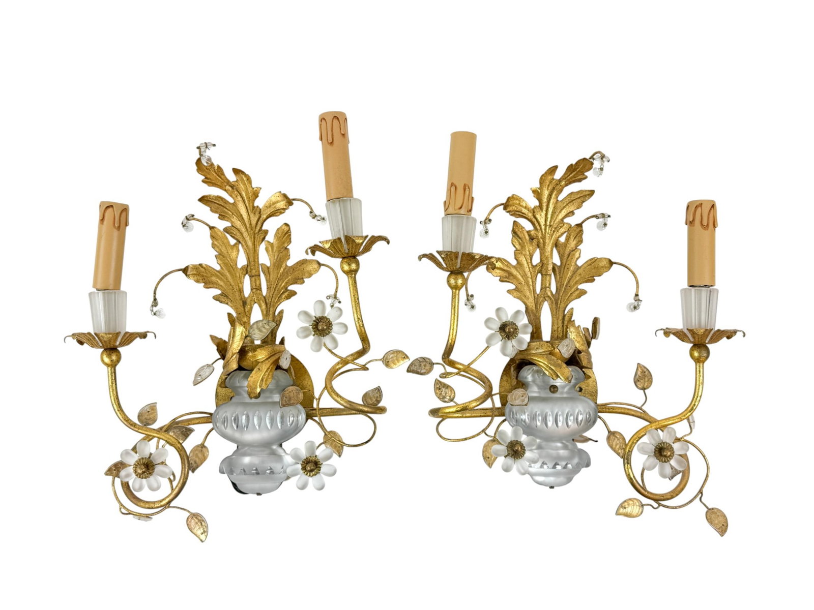 2 Bagues glass floral sconces.: A pair of glass floral wall sconces in the manner of Maison Bagu?s. Mid 20th century. A matched pair of electrified two-light wall sconces formed with scrolling gilt metal arms issuing foliate drip pa