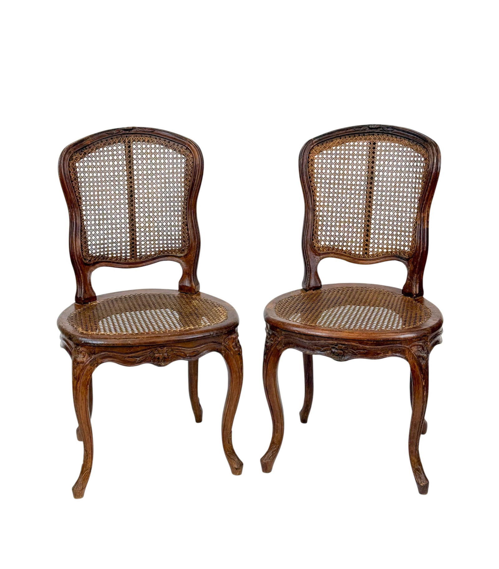 2 French Louis XV cane seated side chairs.: A pair of French Louis XV cane seat and back side chairs, 19th Century. 34" x 18 1/4" x 16 6/8".