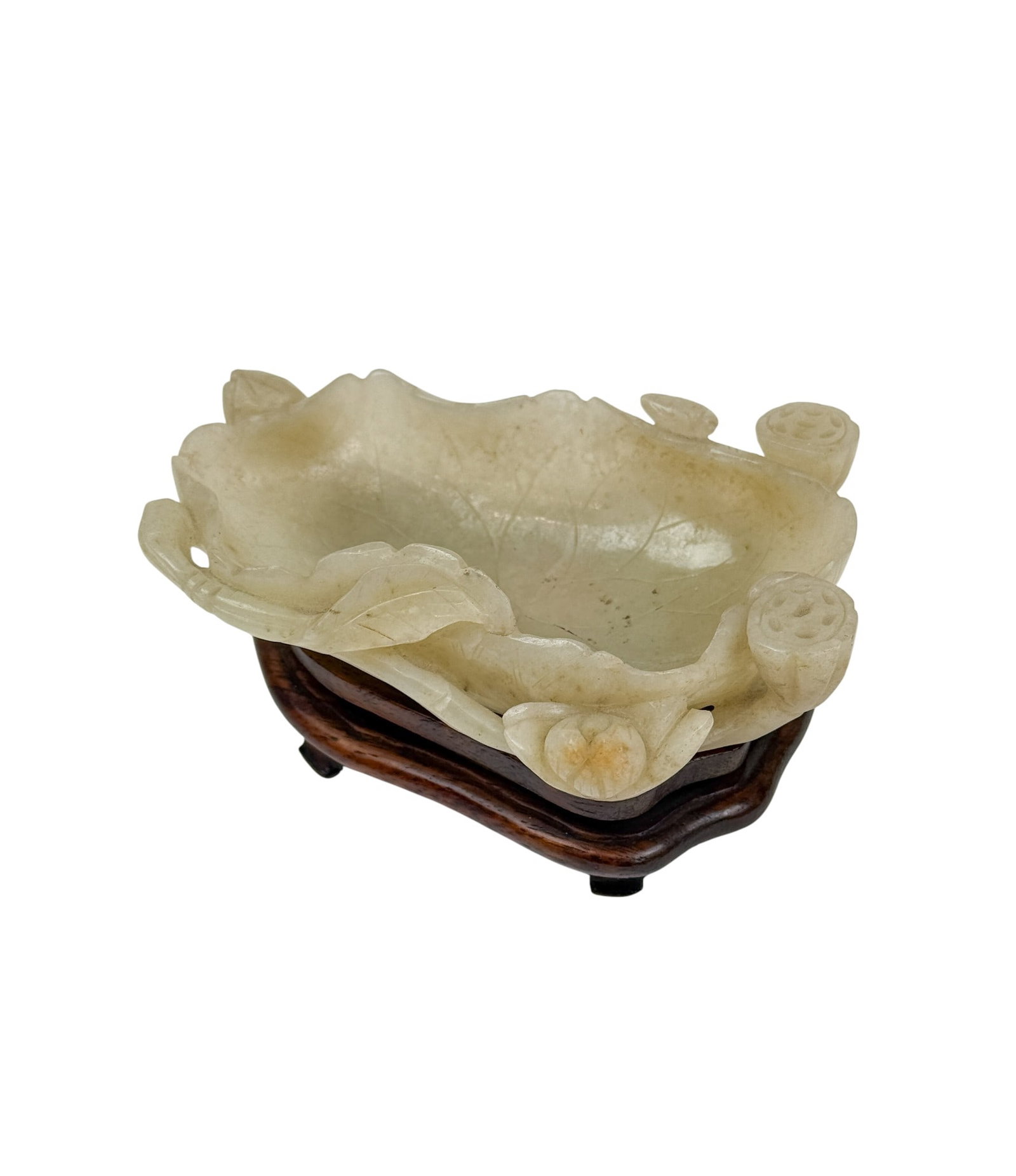 Chinese jade bowl.: A Chinese jade bowl with custom wood stand. Late19th/early 20th century. With stand: 2 1/4" x 4 3/4".