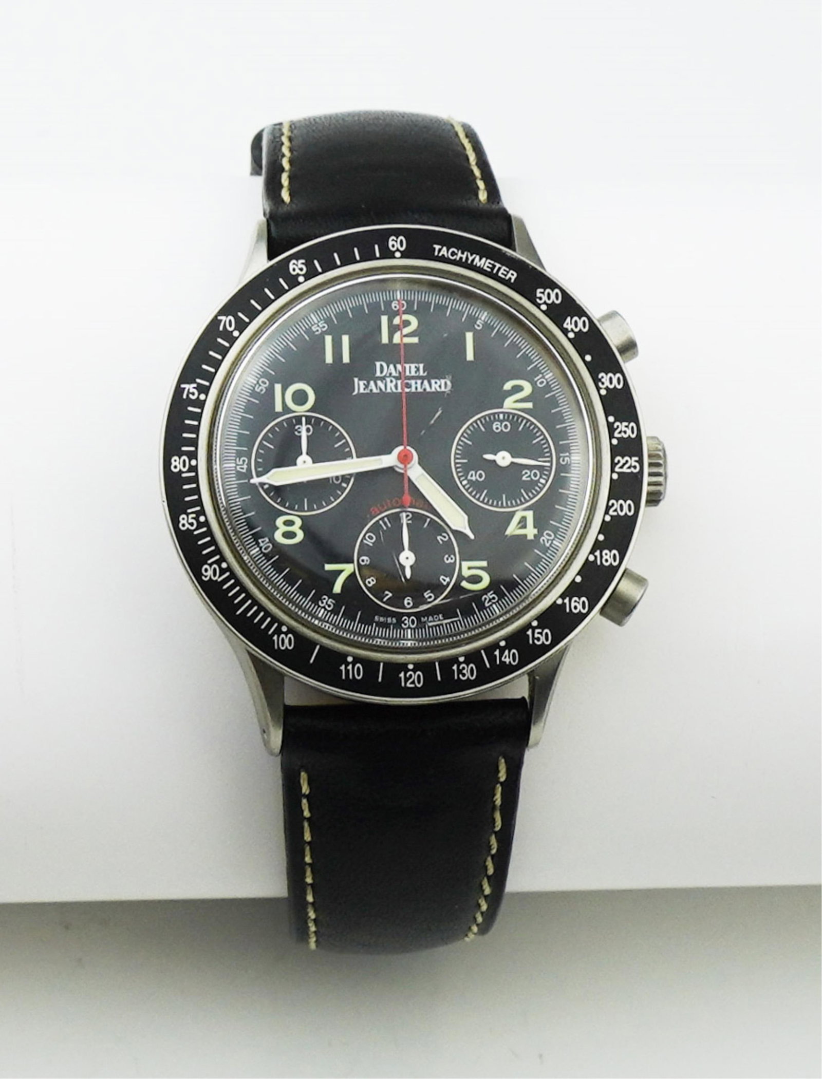 Daniel Jean Richard Chronograph watch.: A Daniel Jean Richard Chronograph watch model 25004, 37.0mm stainless steel case, black dial with white markers, 51 jewel automatic movement, leather strap. Condition: Quinn's does not warranty or gua