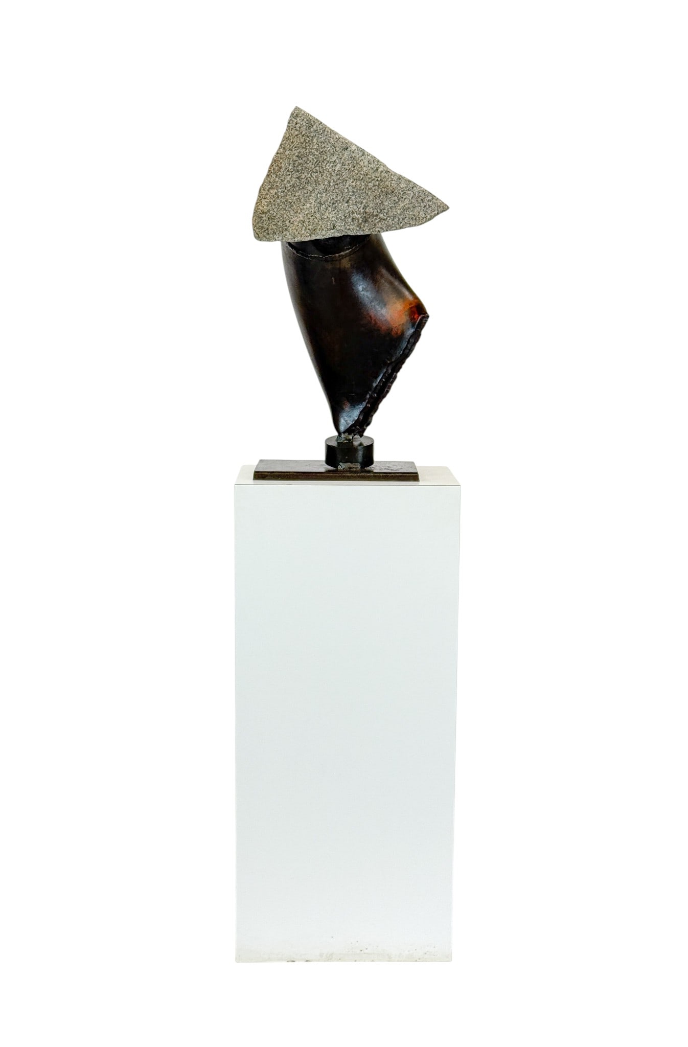 John Van Alstine, "Sciabo Stone Head," 1985.: John Van Alstine (American/New York, b. 1952). "Sciabo Stone Head." Steel and granite sculpture. 1985. 29" x 17" x 15".