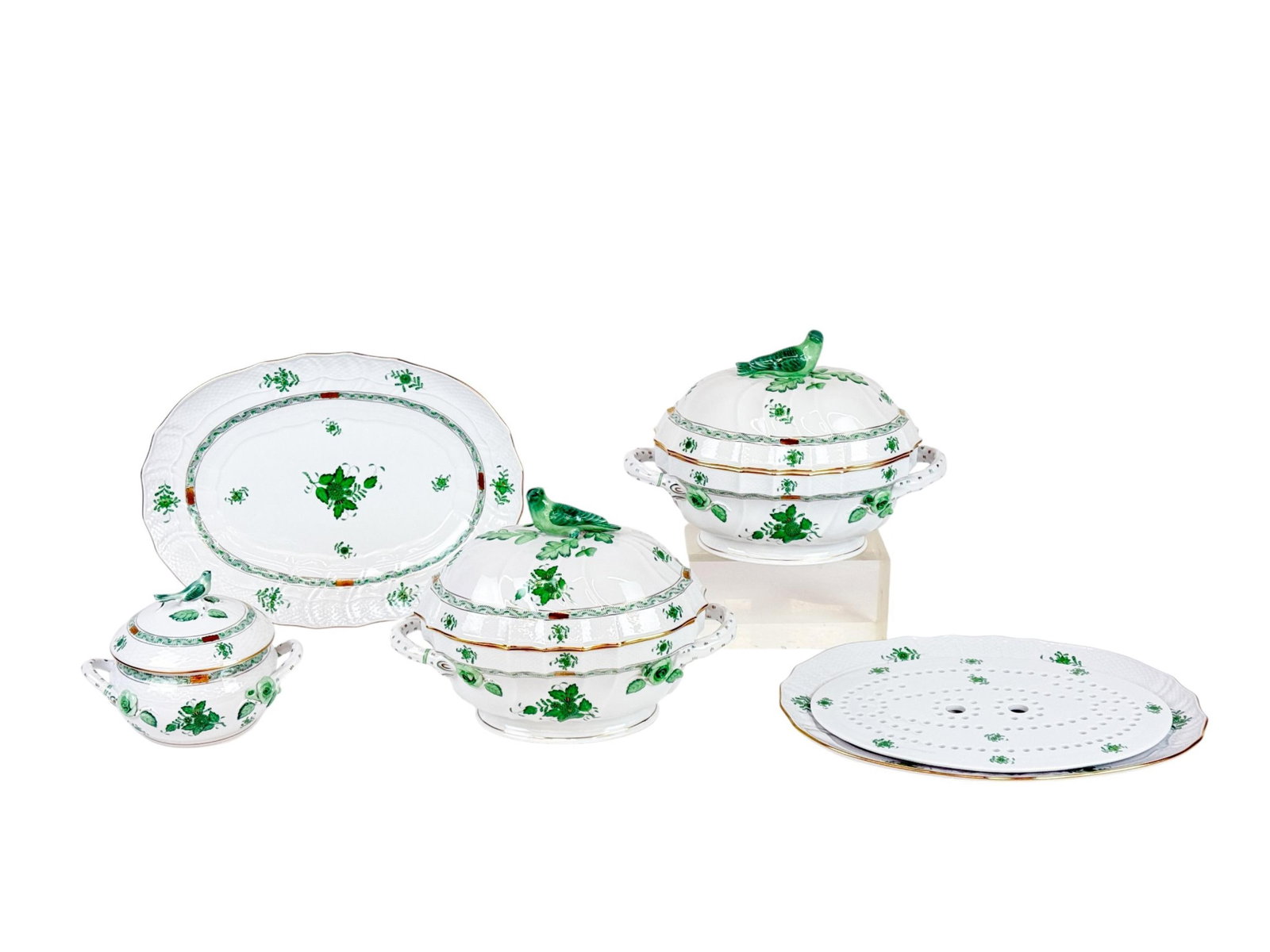 Herend "Chinese Bouquet" serving ware.: A group of green Herend "Chinese Bouquet" porcelain serving ware. 20th century. Hungary. Shield mark and style code on base. ++ Two Lidded tureens with bird finials. 9" x 13". ++ Lidded bean pot with