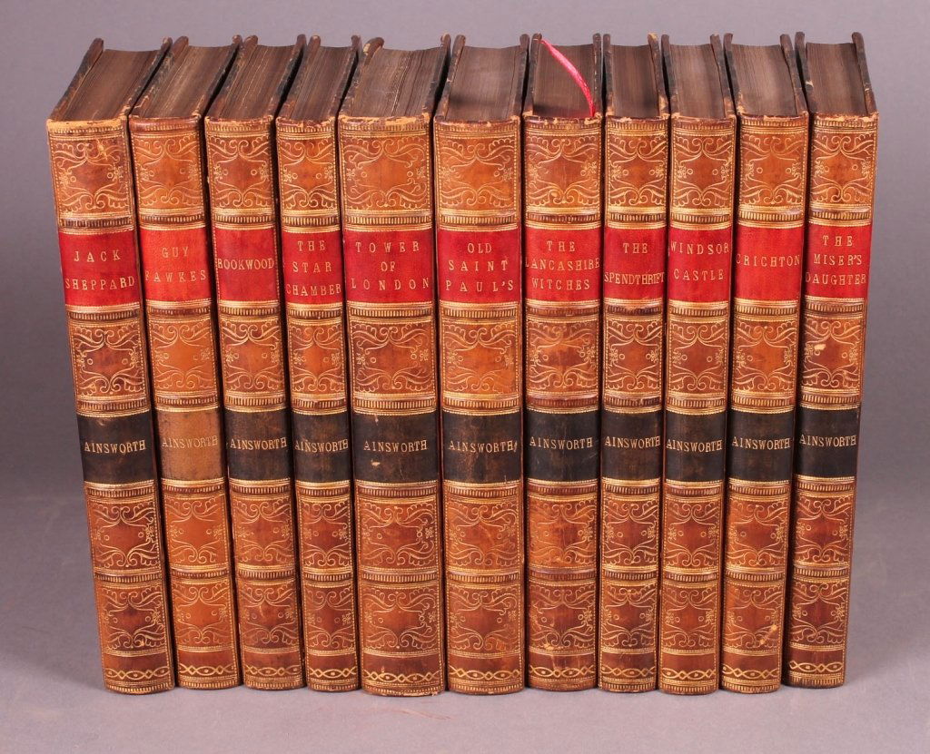 11 Titles by William Henry Ainsworth.: [Cruikshank/Other Illustrators]. 11 Titles by William Harrison Ainsworth. Lon: G. Routledge & Co., 1853-1857. 8vo. Later (but not recent) light brown leather and marbled board. (1 book has “1920”