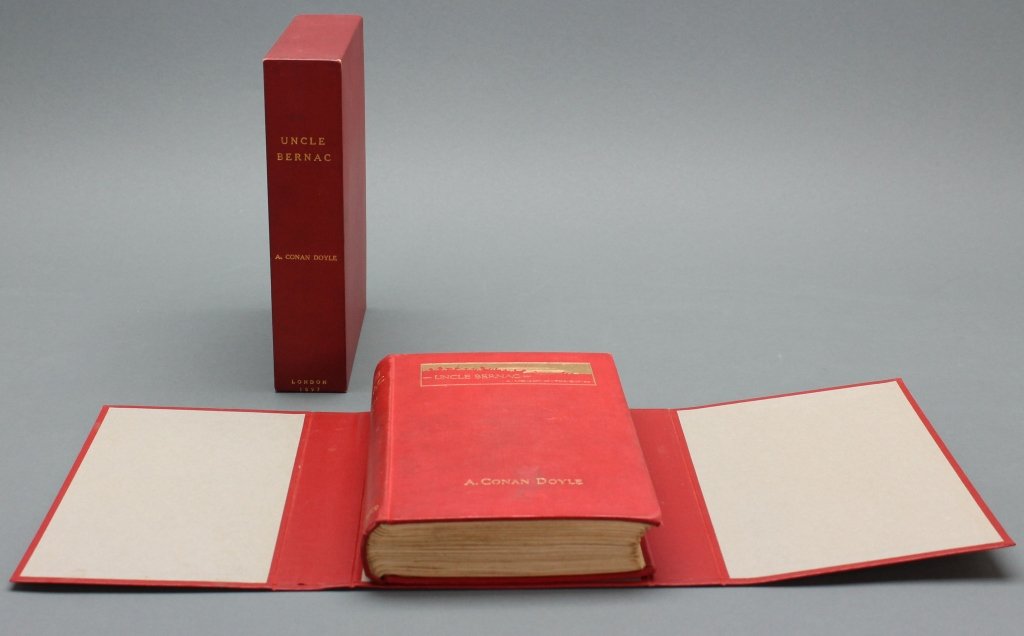 Doyle. UNCLE BERNAC. Lon: Smith, 1897. 1st ed.: [Doyle, Arthur Conan]. UNCLE BERNAC: A Memory of the Empire. Lon: Smith, Elder, & Co., 1897. 8vo. Red cloth blocked and titled in gilt, black endpapers. Faint soil to covers, flyleaves foxed, rear hin