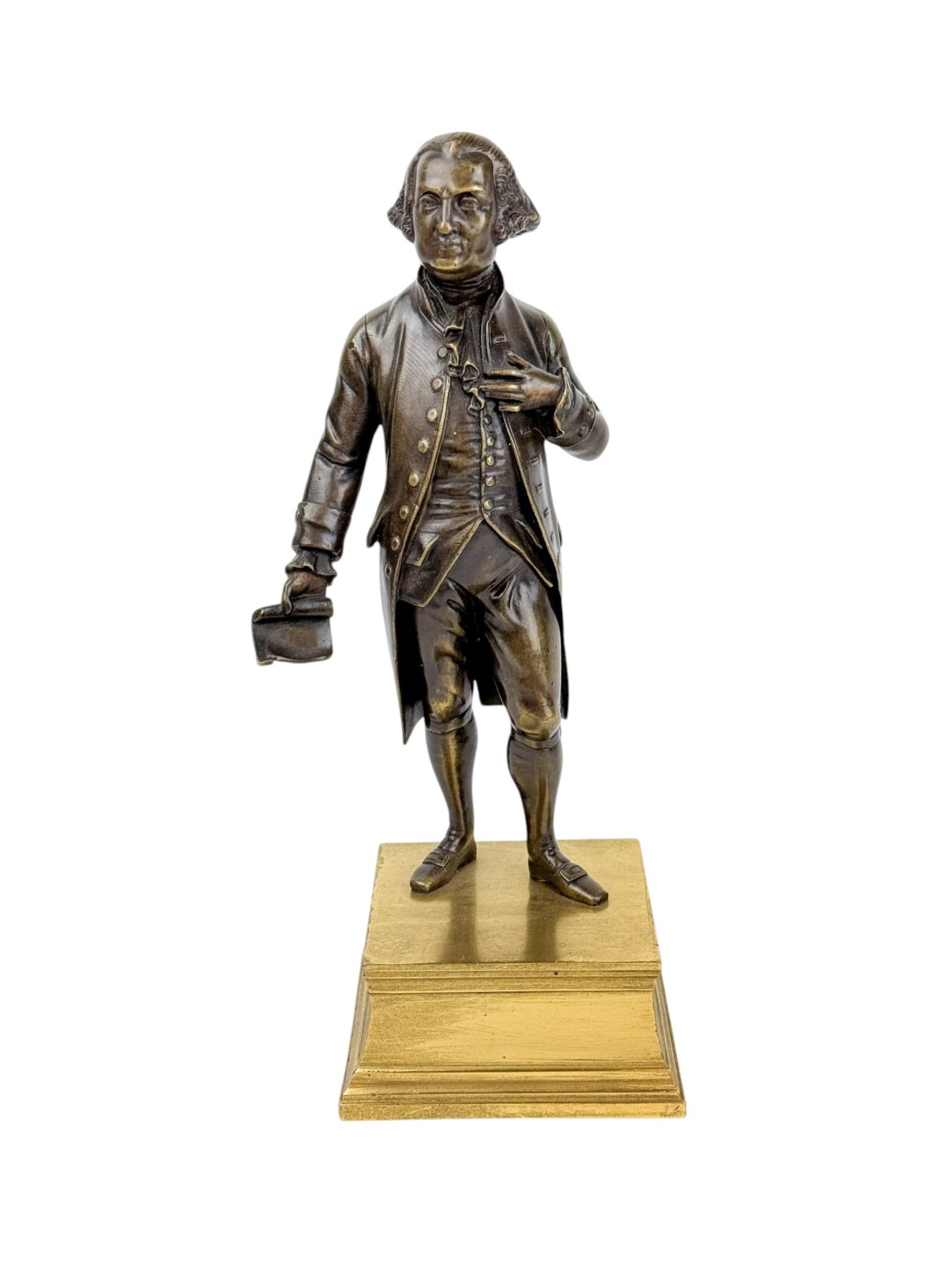 George Washington, bronze.: A French bronze figure of George Washington with a book in his right hand. mid 19th century. Figure attached to gilt metal base. 10 3/4" x 3 7/8".
