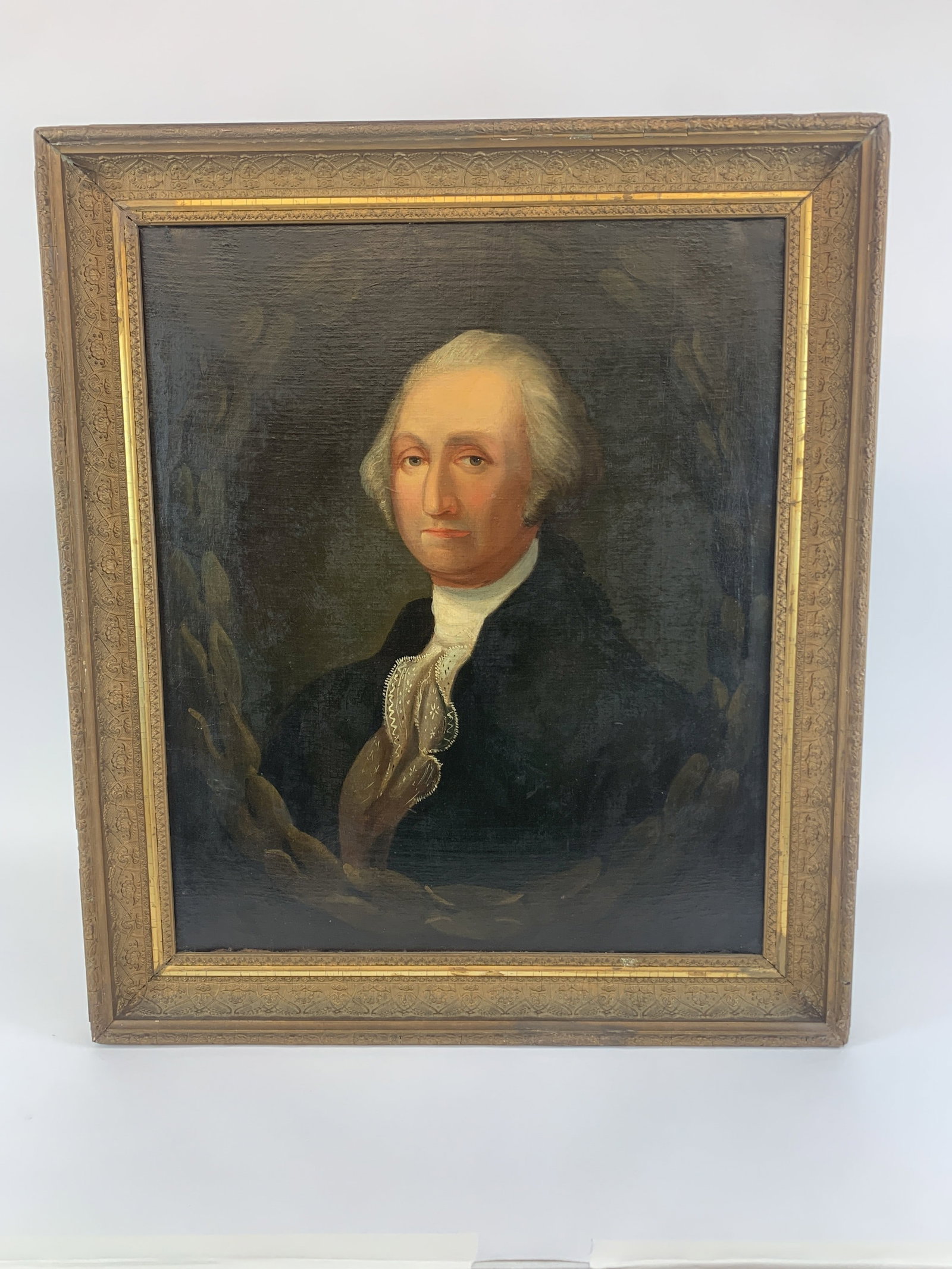 George Washington portrait, O/C.: A portrait of George Washington. Oil on canvas. 19th to 20th century. Sight: 29 1/2" x 24 1/2". Frame: 36" x 31". Condition: Craquelure.