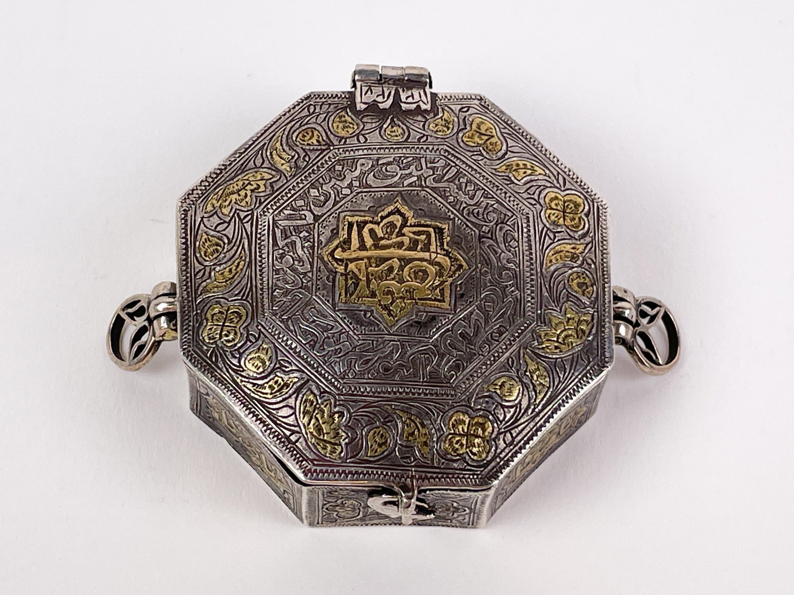 2 Silver Islamic cases. - 2