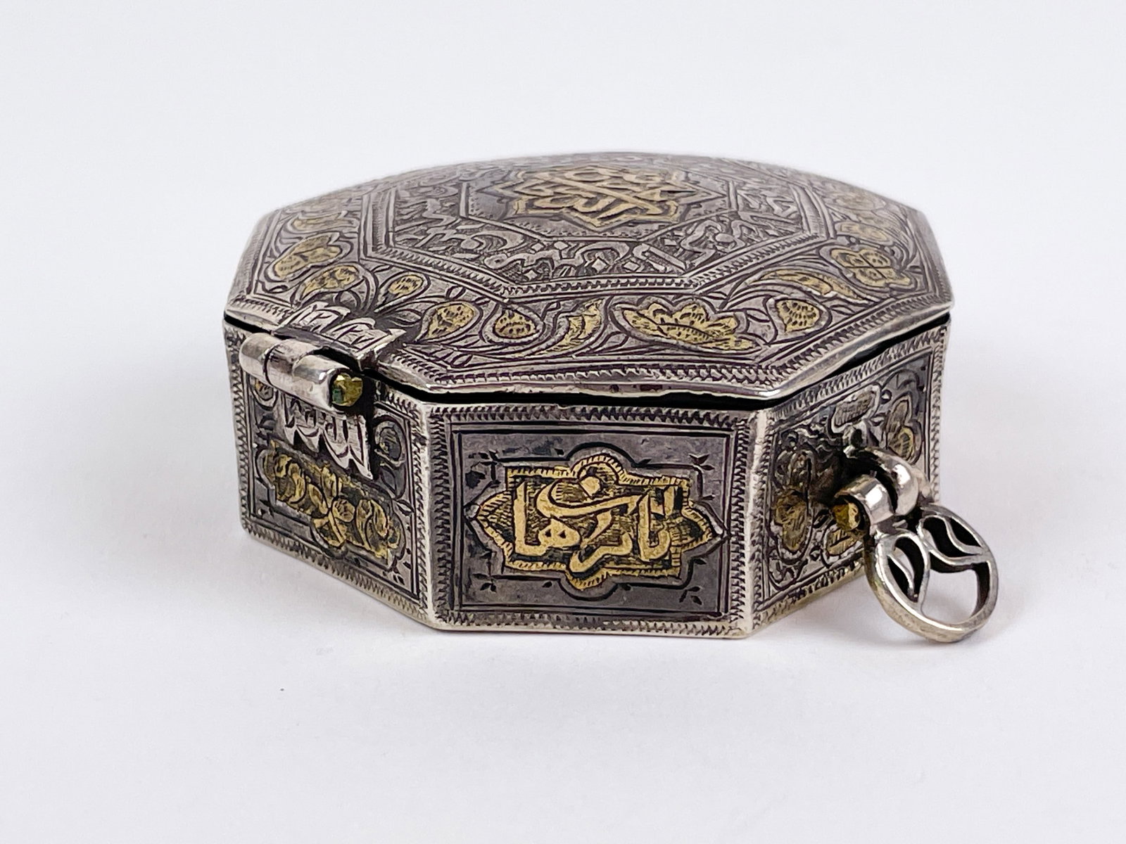 2 Silver Islamic cases. - 3