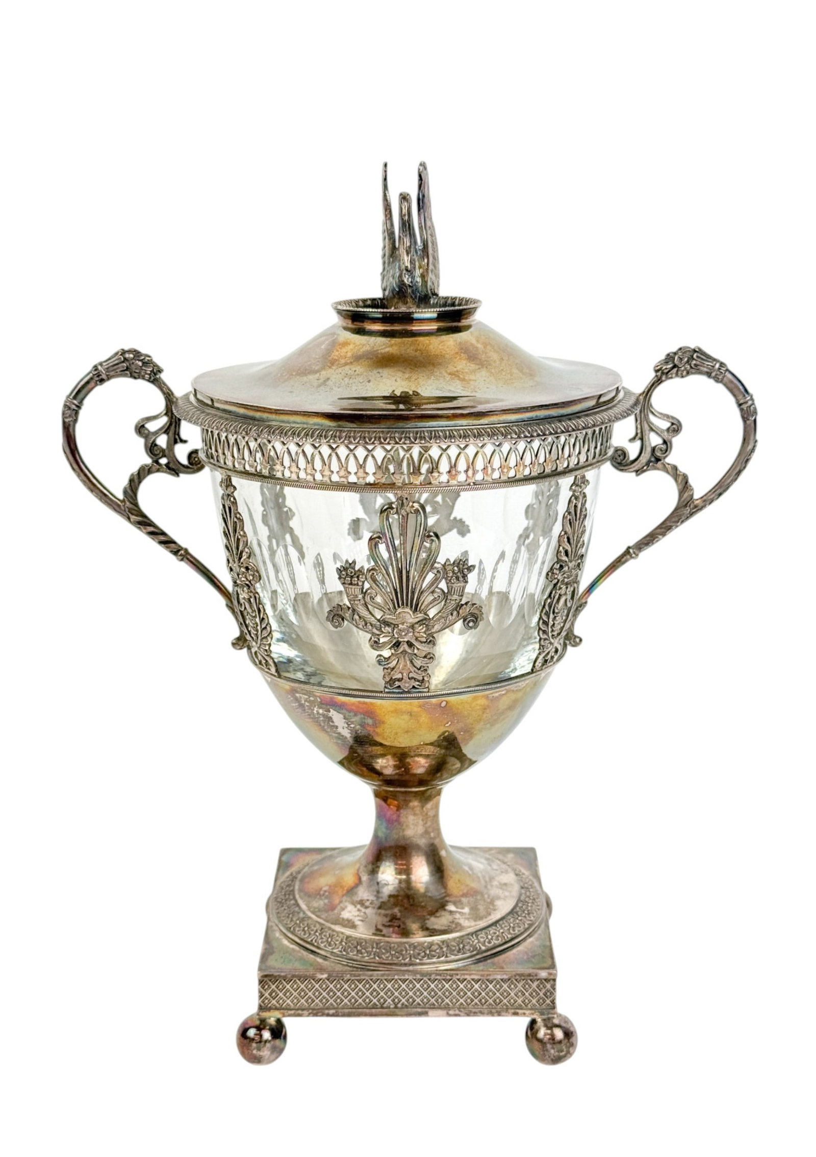 French silver CL Bourgeois drageoir.: A French Charles Louis Bourgeois silver drageoir with crystal insert. Swan finial lid. With pierced body with palmetto designs raised on a square base with ball feet. Lid marked with 1793 Greek