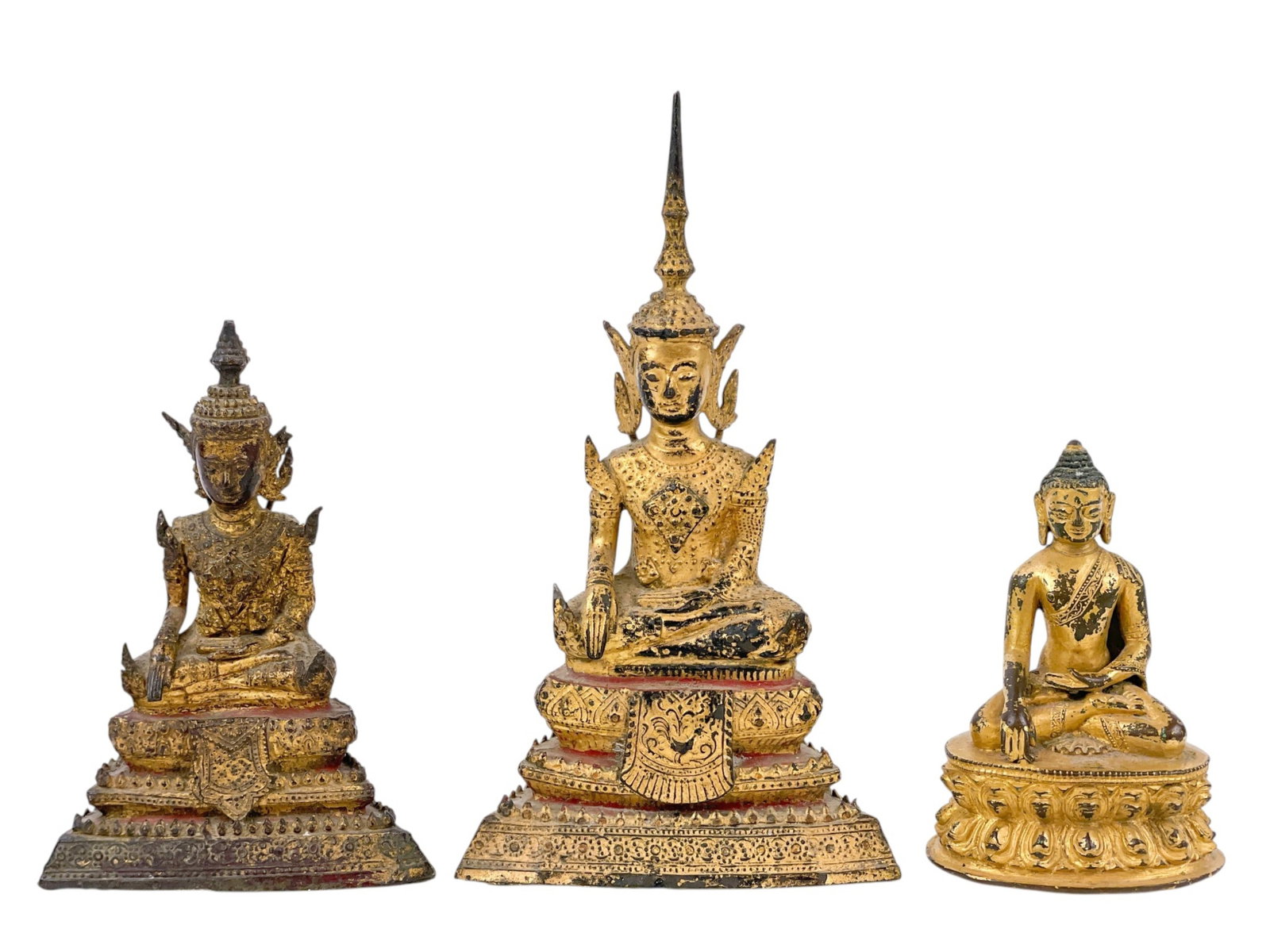 3 Buddhas.: A group of three metal Buddhas. Smallest: 4 1/2" x 3 1/8". Largest: 8 3/8" x 4 3/4". Condition: Abrasions, pigment loss.