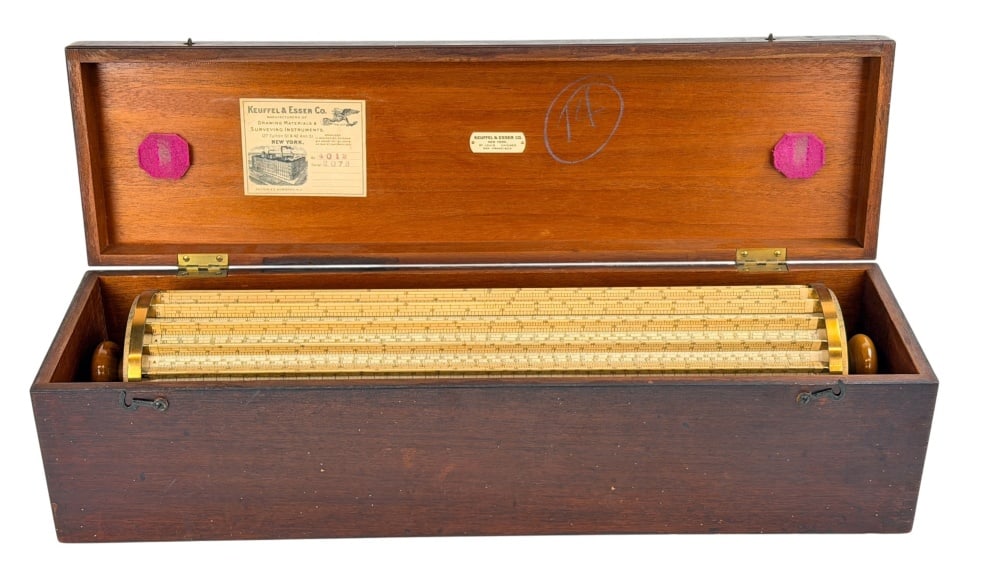 Keuffel & esser model 4012 thacher cylindrical sli: Keuffel & esser model 4012 thacher cylindrical slide rule American, New York and Hoboken, New Jersey, circa 1907. Serial no. 2073. Brass cylindrical calculating instrument with twenty rotating,