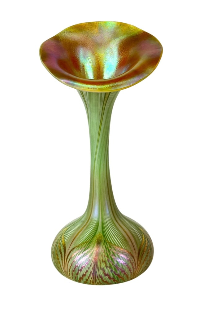 Quezal Art Glass and Decorating Company, New: York, pulled-feather Jack-in-the-Pulpit vase, circa 1905?1920. Approximately 12_ inches high, the vase has a rounded foot rising through a long slender neck to a broad, asymmetrically folded floriform