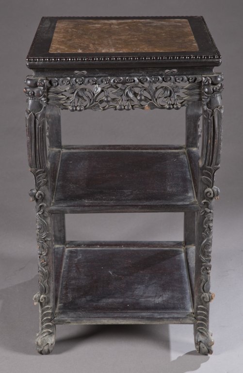 Two Tiered Asian Taboret Stand with Marble Top: A Chinese hardwood taboret stand. 19th century. With marble inset top and 2 lower shelves. 32"h x 18"w x 18"d.