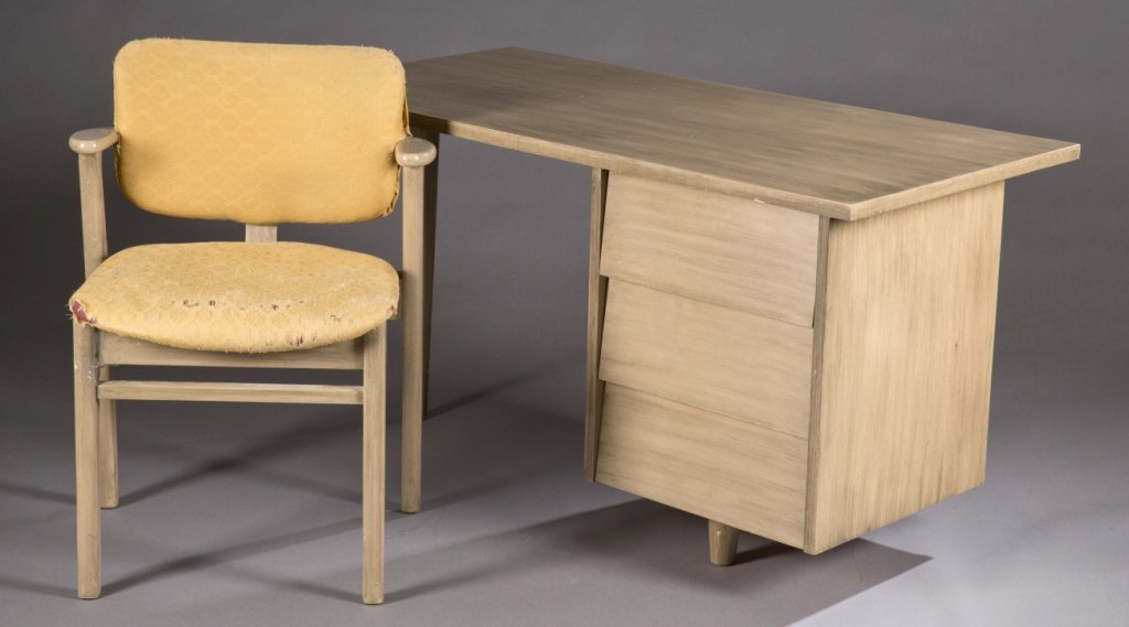 A Florence Knoll's Model 17 maple desk and chair.: A Florence Knoll Model 17 maple desk and chair. 3rd quarter 20th century, designed 1952. With later painted finish, original sticker partially found on inside of bottom drawer. Desk: 48"h x 26 1/2"w x
