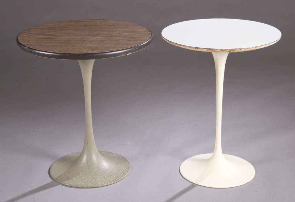 Pair of Eero Saarinen for Knoll style side tables.: A pair of Eero Saarinen design style side tables. ++ An Eero Saarinen for Knoll side table with a white laminate top. Knoll label is in tact. ++ An Eero Saarinen for Knoll style side table with a wood